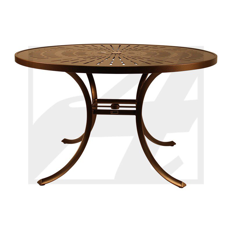 Round wooden table with curved legs and a decorative top.