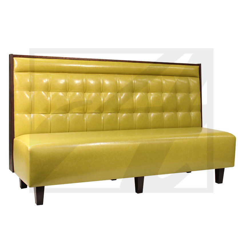 Yellow tufted booth seating with dark wooden legs.