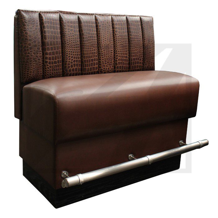 Brown leather restaurant booth seat with vertical stitching and footrest.