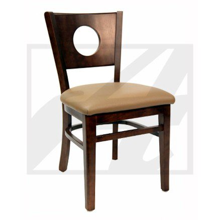 Wooden chair with a cushioned beige seat and circular cut-out on the backrest.
