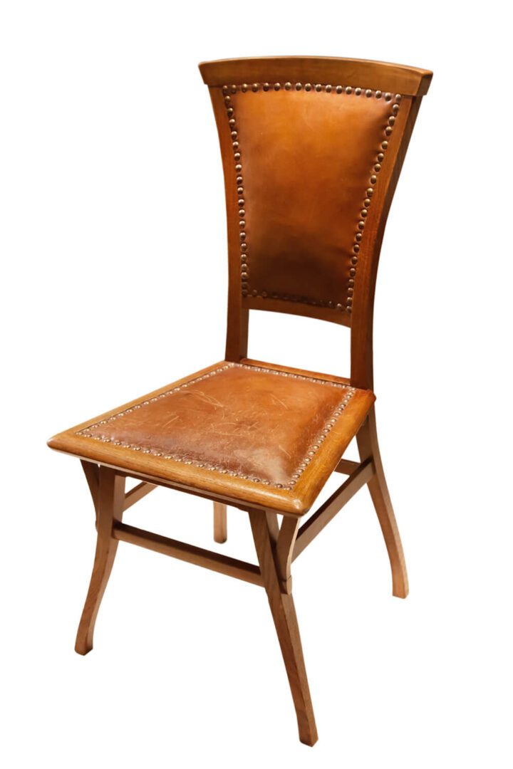 Elegant vintage wooden chair with leather upholstery.