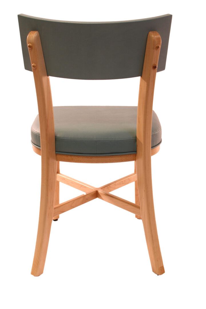 Wooden chair with cushioned seat and backrest.