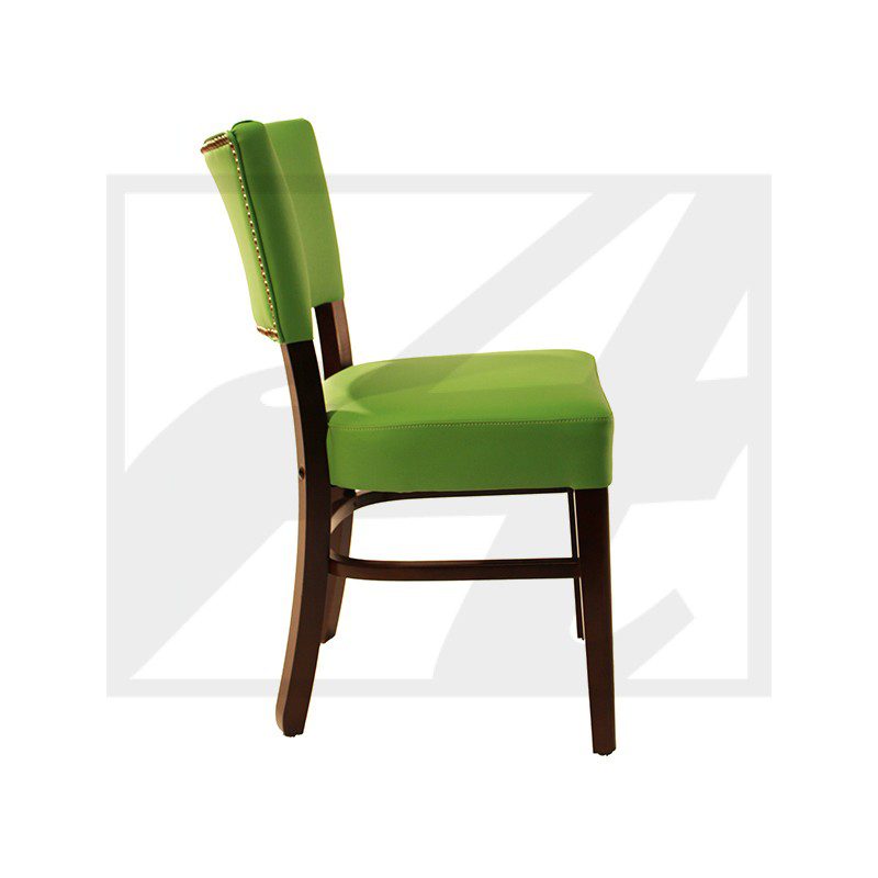 Side view of a green upholstered wooden chair.