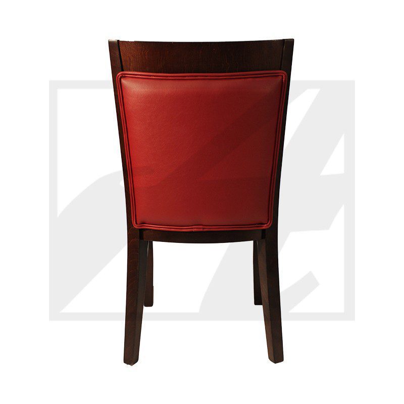 Red cushioned chair with wooden frame, back view.