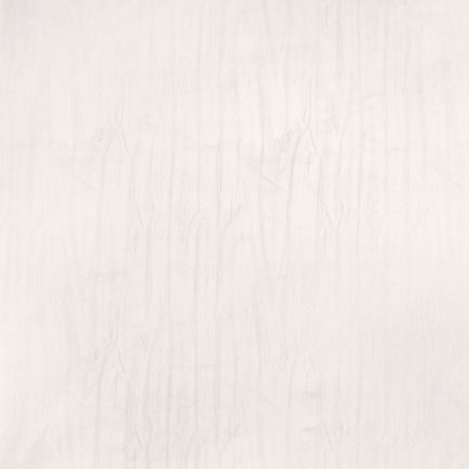 Close-up of a light beige textured fabric or paper surface.