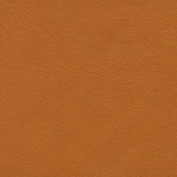 Close-up of light brown leather texture.