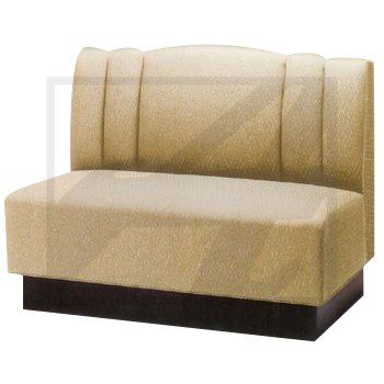 Modern beige upholstered booth seat with a black base.