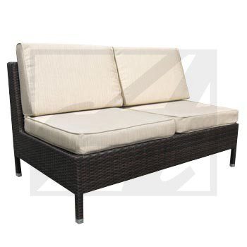 Two-seater outdoor wicker sofa with cream cushions.