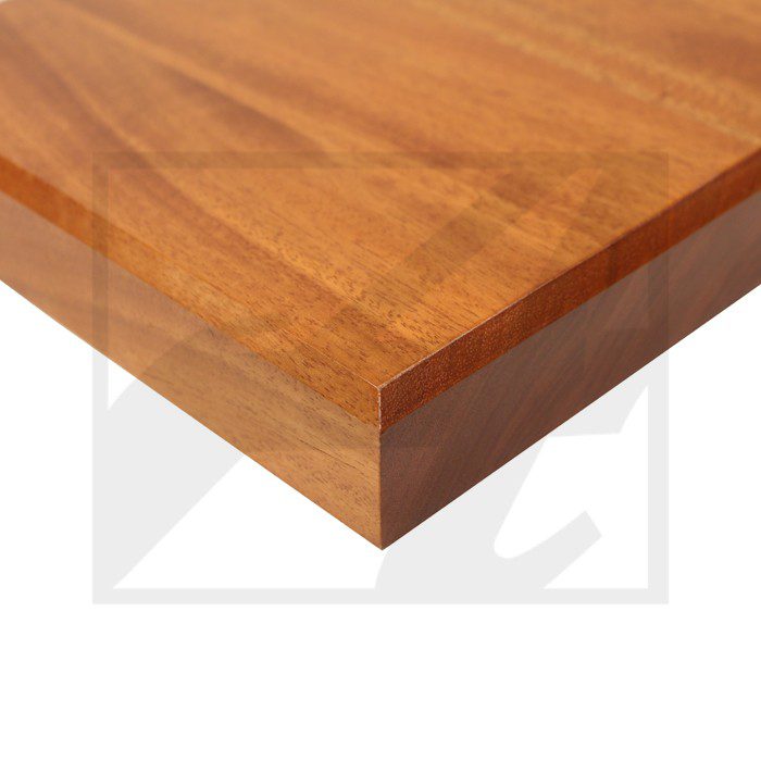 Close-up of a polished wooden tabletop corner.