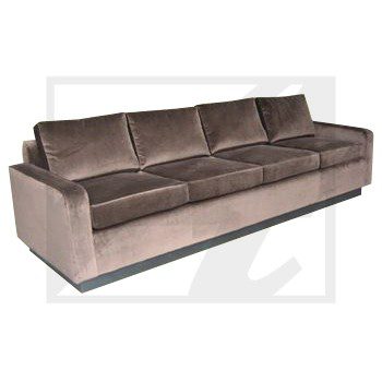 Plush brown velvet sofa with sleek modern design.