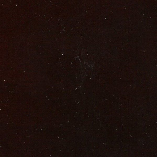 Dark brown leather surface with subtle texture.