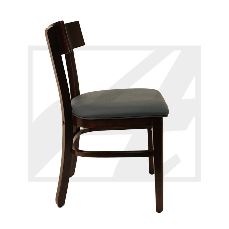 Side view of a dark wooden chair with a cushioned seat.