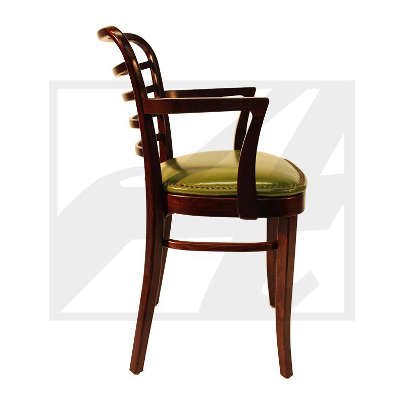 Side view of a wooden chair with green cushioned seat and curved backrest.
