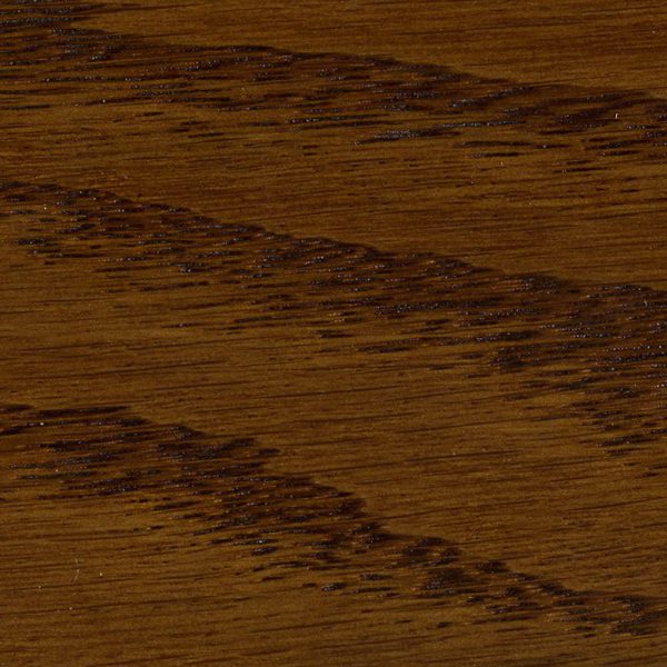 Close-up of dark wood grain texture on a wooden surface.
