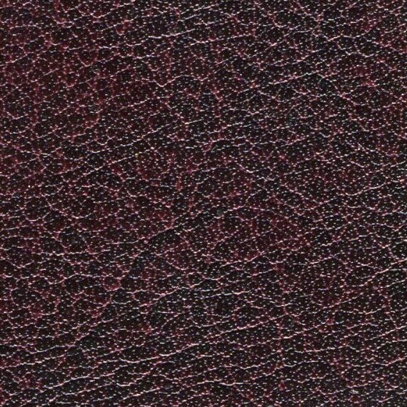 Close-up of dark brown textured leather surface.