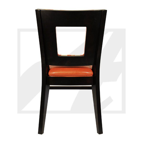 Black chair with orange cushioned seat and square cut-out backrest.