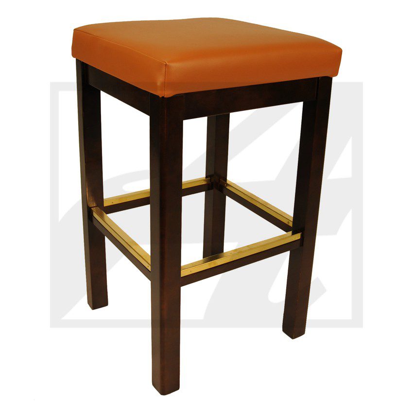 Wooden bar stool with orange cushioned seat and brass footrest.