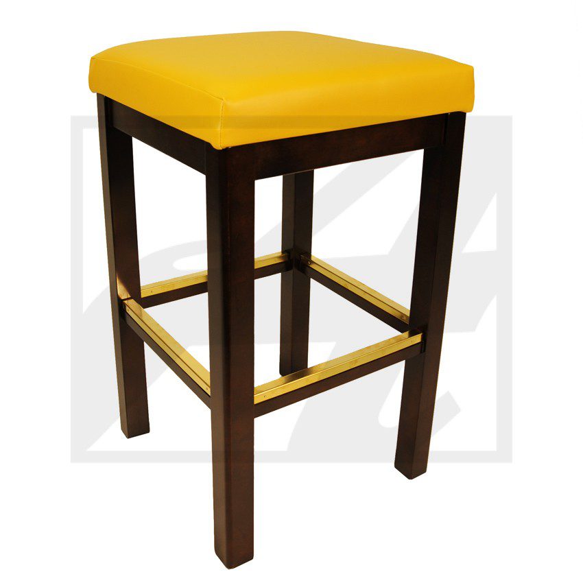 Wooden stool with a yellow cushioned seat.