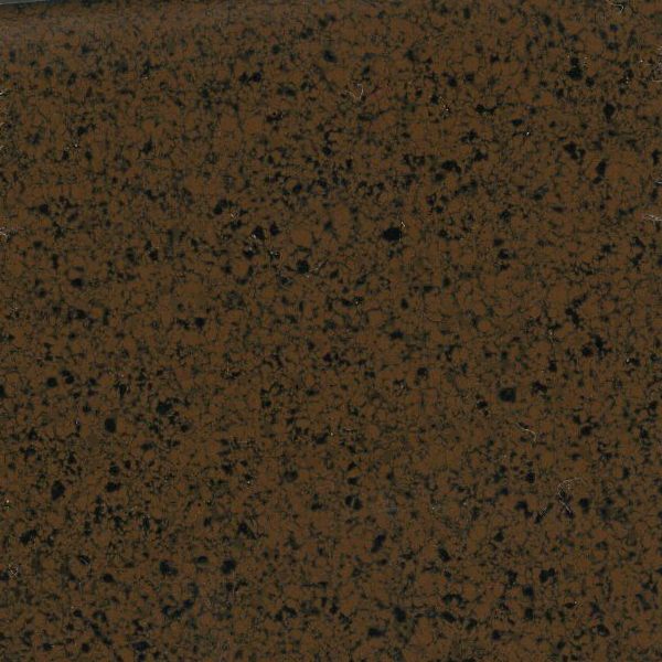 Close-up of a brown speckled granite surface.