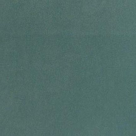 A plain teal-green textured surface.