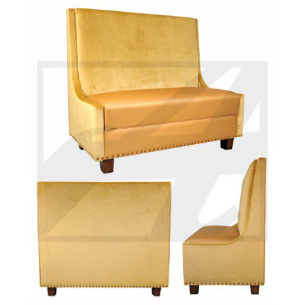 Vintage mustard yellow upholstered loveseat with wooden legs.