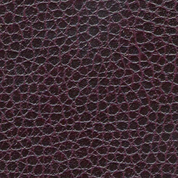 Close-up of dark brown textured leather material.