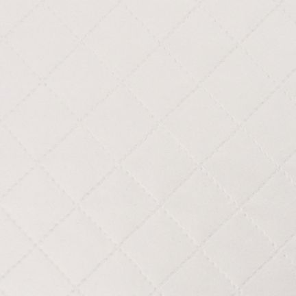 White quilted fabric with diamond pattern.