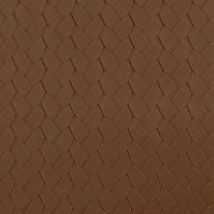 Close-up of a textured brown surface with a diamond pattern.