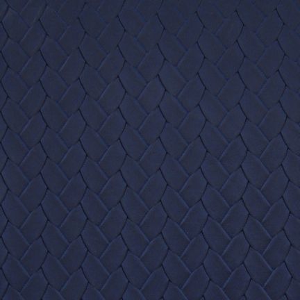 Dark blue fabric with a subtle hexagonal pattern.