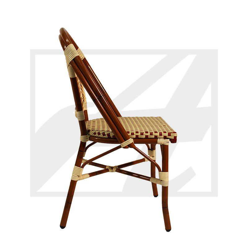 Side view of a wooden chair with woven seat and backrest.