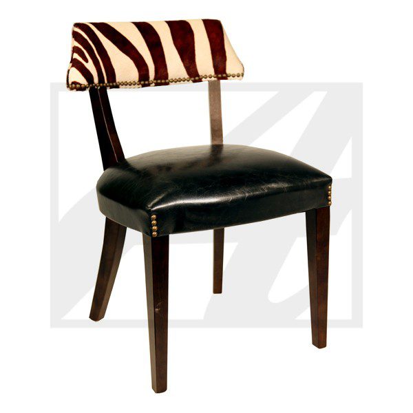 Elegant chair with zebra-print backrest and black leather seat.
